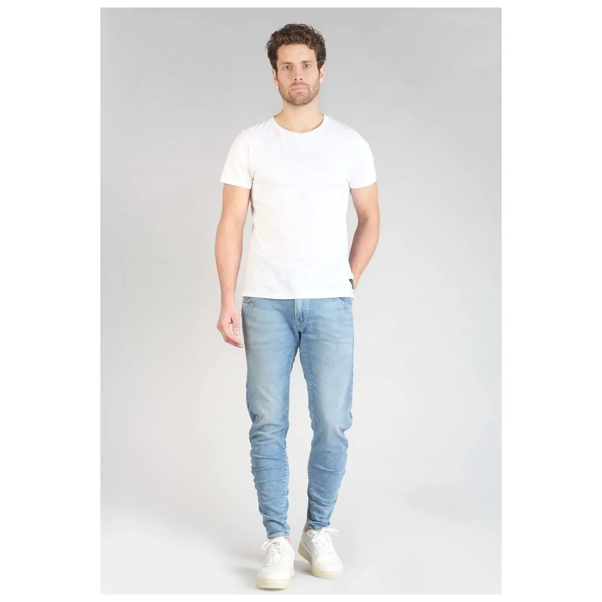 Jeans tapered , largo 34